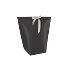TRAPEZOIDAL POUCH WITH DECORATIVE CENTER RIBBON