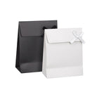 TRIANGULAR POUCH WITH DECORATIVE SIDE RIBBON